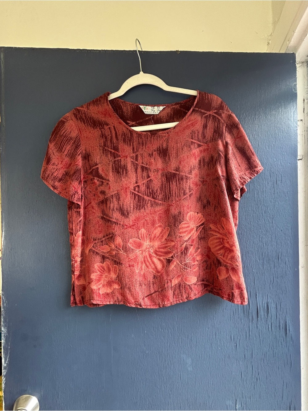 Cropped silk blouse in rust red